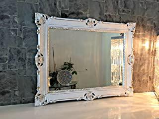 Recensioni di specchio con cornice argento